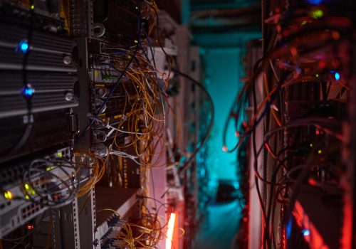 Background image of server room with internet cables and wires, copy space